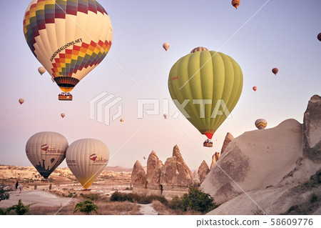 Cappadocia hot air balloon at sunrise 58609776