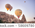 Cappadocia hot air balloon at sunrise 58609780