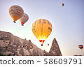 Cappadocia hot air balloon at sunrise 58609791