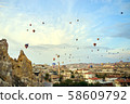 Cappadocia hot air balloon at sunrise 58609792
