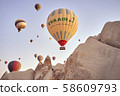 Cappadocia hot air balloon at sunrise 58609793