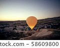Cappadocia hot air balloon at sunrise 58609800