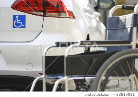 Person with a disability, wheelchair, car image Person with a disability, wheelchair, car image 58610031