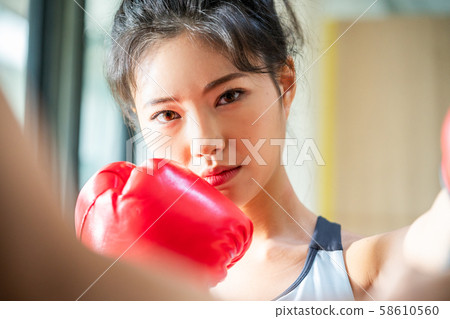 Female martial art boxing 58610560