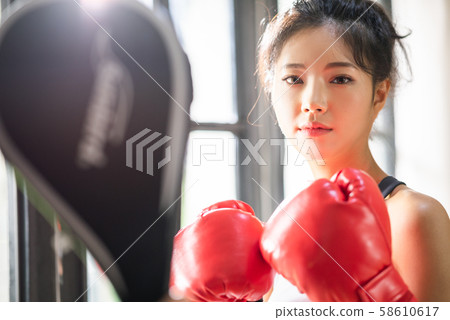 Female martial art boxing 58610617