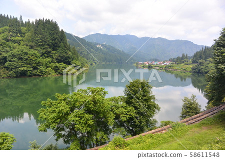 Tadami River flowing through Minamiaizu Tadami River flowing through Minamiaizu 58611548