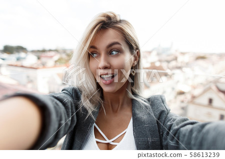 Funny beautiful young woman with a smile 58613239