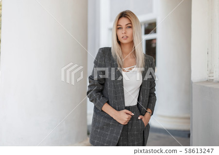 Beautiful young stylish model blond girl Beautiful young stylish model blond girl 58613247