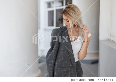 Stylish beautiful young blond model woman Stylish beautiful young blond model woman 58613254