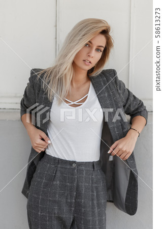 Stylish beautiful young woman  58613273