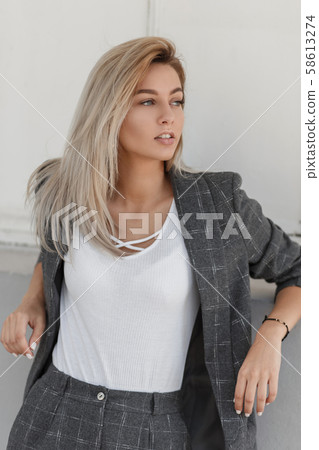 Beautiful young stylish model blond woman  58613274