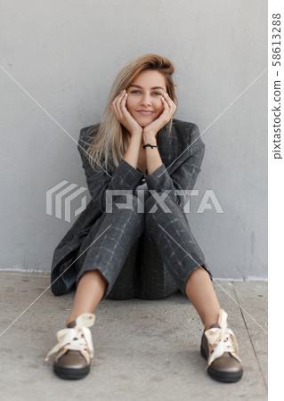 Funny beautiful young girl with a smile Funny beautiful young girl with a smile 58613288