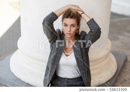 Young beautiful stylish woman Young beautiful stylish woman 58613309