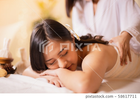 Asian Beautiful, young and healthy woman in spa Asian Beautiful, young and healthy woman in spa 58617711