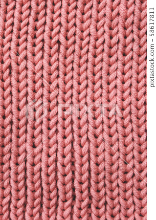 Pastel pink knitted texture for background, merino yarn 58617811