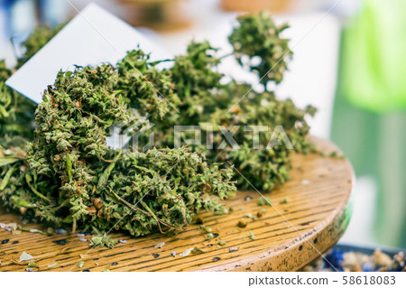 cannabis sativa dried marijuana closeup on table 58618083