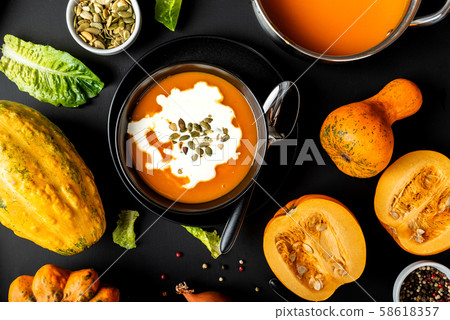 Pumpkin cream soup with milk. Close-up. 58618357