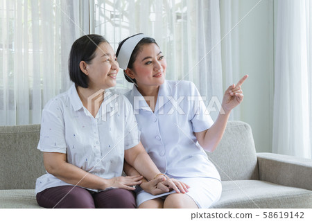 Nurses take care of patients elderly with Nurses take care of patients elderly with 58619142
