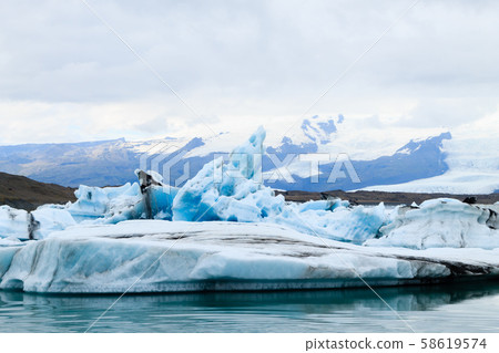 Icebergs on water, Jokulsarlon glacial lake, Icebergs on water, Jokulsarlon glacial lake, 58619574