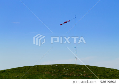 Isolated windsock on blue sky, sport background 58619608