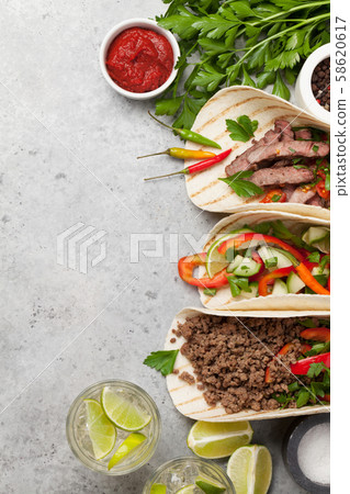 Mexican tacos and caipirinha cocktail 58620617