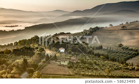 Tuscany foggy hills panorama view crop 58623495