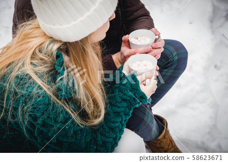 Cheerful date. A couple has fun and laugh while 58623671
