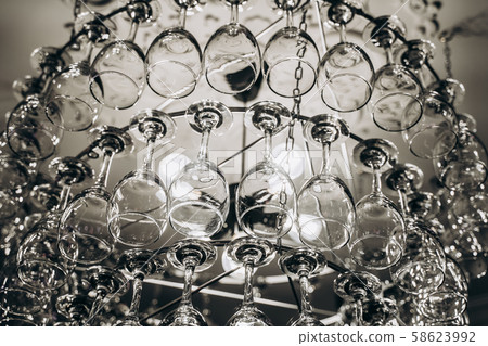 Beautiful chandelier made with glasses of wine Beautiful chandelier made with glasses of wine 58623992