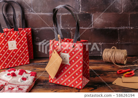 Gift boxes wrapped in red checked paper. Valentines day, Christmas, New year gift packing. Holiday 58626194