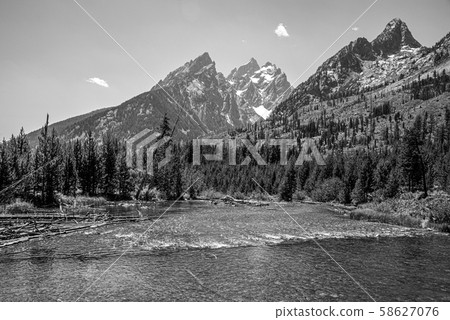 Peak of th Grand Teton by Jenny lake 58627076