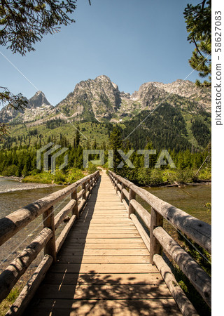 Peak of th Grand Teton by Jenny lake 58627083