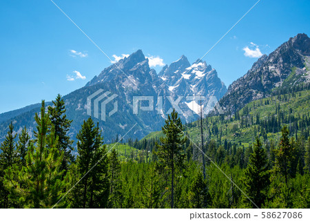Peak of th Grand Teton by Jenny lake Peak of th Grand Teton by Jenny lake 58627086