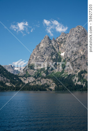 Glacier between peaks of the Grand Tetons 58627103