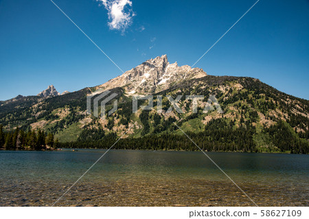 Peak of th Grand Teton by Jenny lake 58627109