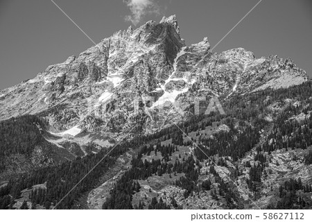 Peak of th Grand Teton by Jenny lake 58627112