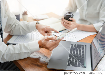 Business People Talking Discussing with coworker 58628172