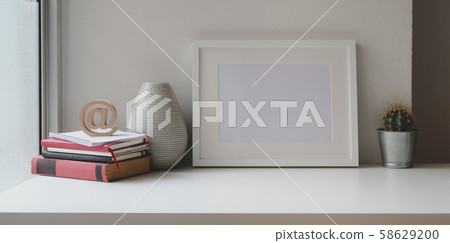 Comfortable workspace with mock up frame, office Comfortable workspace with mock up frame, office 58629200