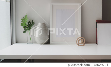 Contemporary workspace with mock up frame, office Contemporary workspace with mock up frame, office 58629201