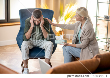 Psychoanalyst supporting client who feeling very depressed Psychoanalyst supporting client who feeling very depressed 58634391