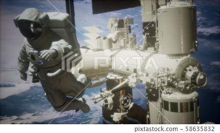 International Space Station and astronaut in outer International Space Station and astronaut in outer 58635832