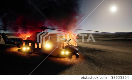 burned military helicopter in the desert at sunset 58635864