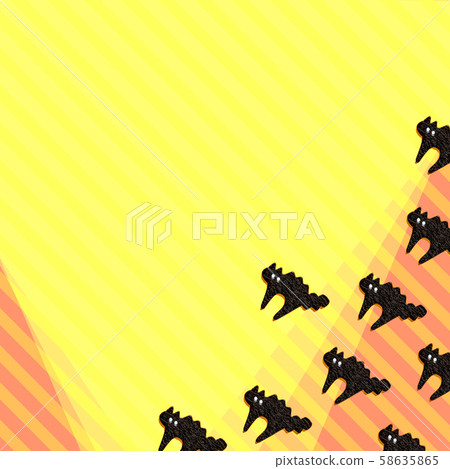 Orange and yellow striped stripes and black cats side by side on a plain yellow background copy space 58635865