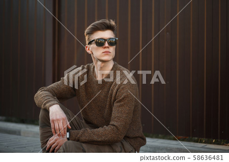 Handsome young stylish guy in fashion clothes Handsome young stylish guy in fashion clothes 58636481