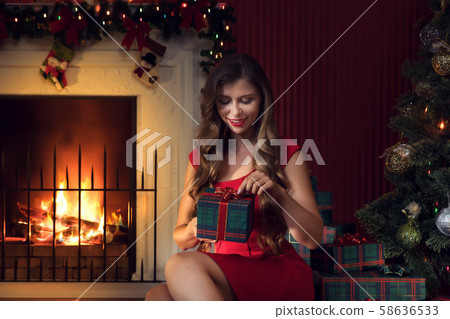 by the fireplace by the fireplace 58636533