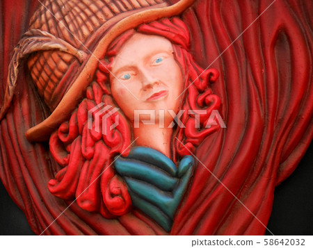 Picture of a woman with red hair at the entrance of a bar Picture of a woman with red hair at the entrance of a bar 58642032