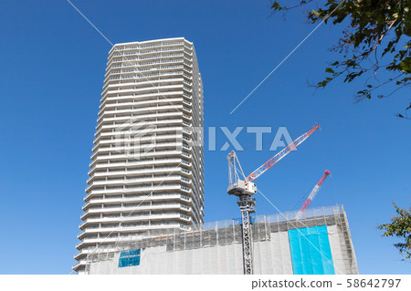 Tower condominium and construction site in Yokohama Tower condominium and construction site in Yokohama 58642797