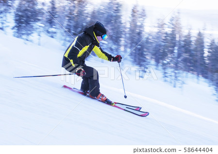 Skier in mountains 58644404