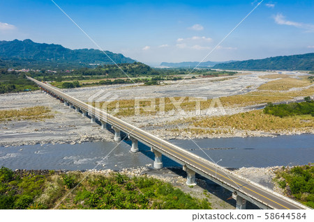 bridge over river with golden miscanthus bridge over river with golden miscanthus 58644584