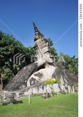 Big sleep buddhist at Buddha park,Wat xiengkuane, Big sleep buddhist at Buddha park,Wat xiengkuane, 58645998