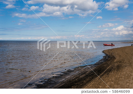 Sand beach with clouds in Urmala. 58646099